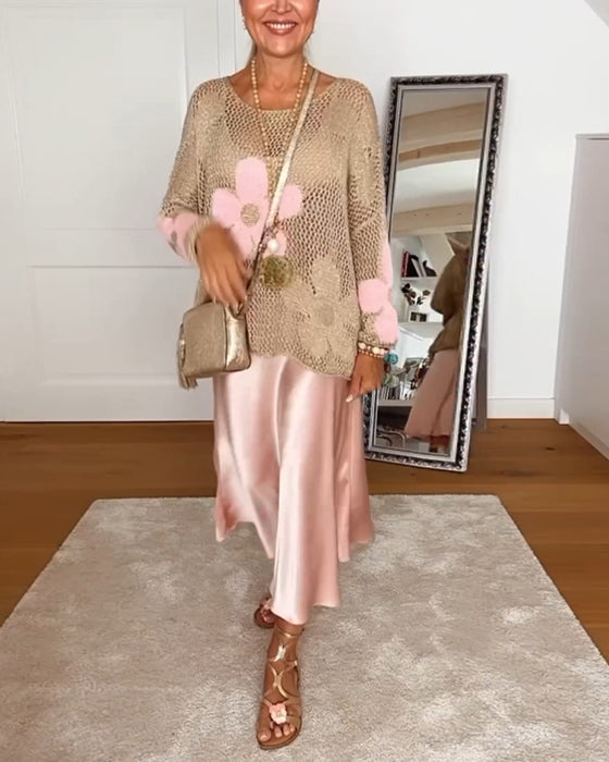 Hulmønstret sweater med blomstermotiver