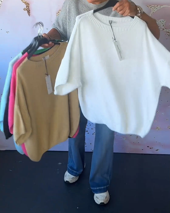 Løs ensfarvet pullover med rund hals