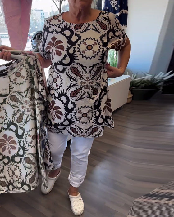 Afslappet blomsterbluse med rund hals
