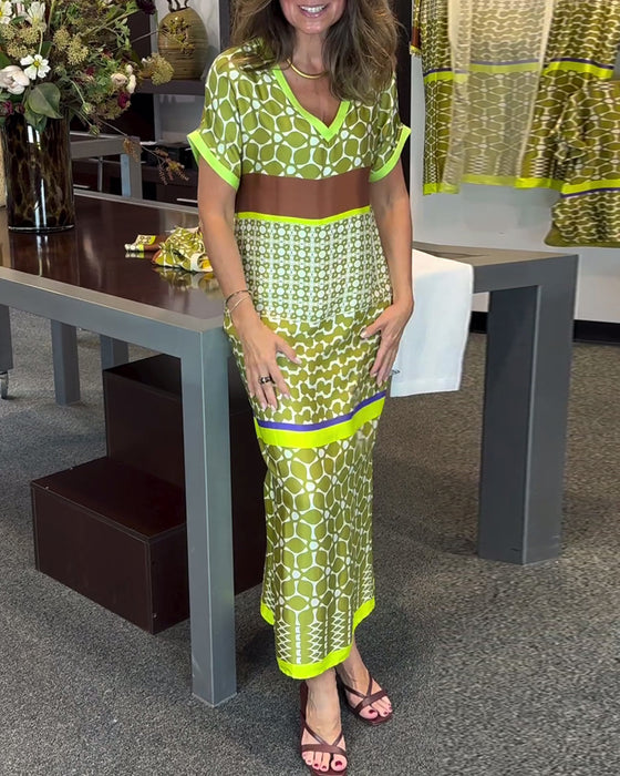 Lang kjole med V-udskæring og kontrastprint