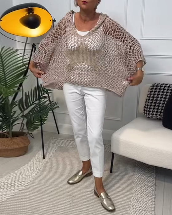 Ensfarvet hullet sweater i løs pasform