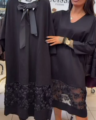 Stilfuld Kjole Med Sløjfe På Bagsiden Og V-Hals