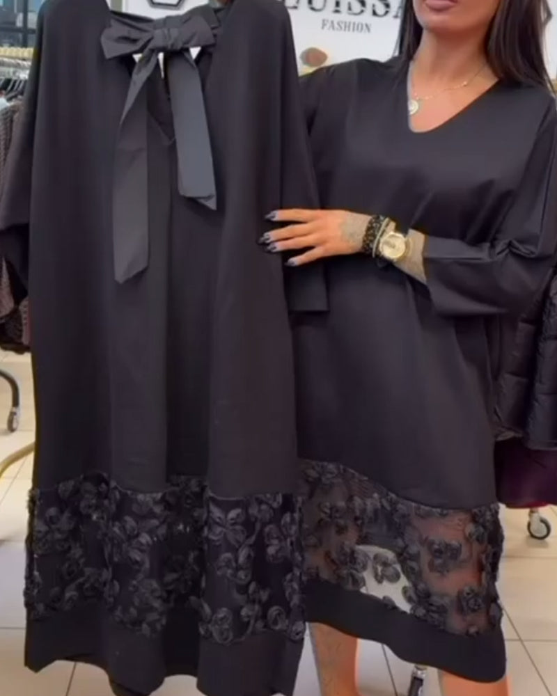 Stilfuld Kjole Med Sløjfe På Bagsiden Og V-Hals