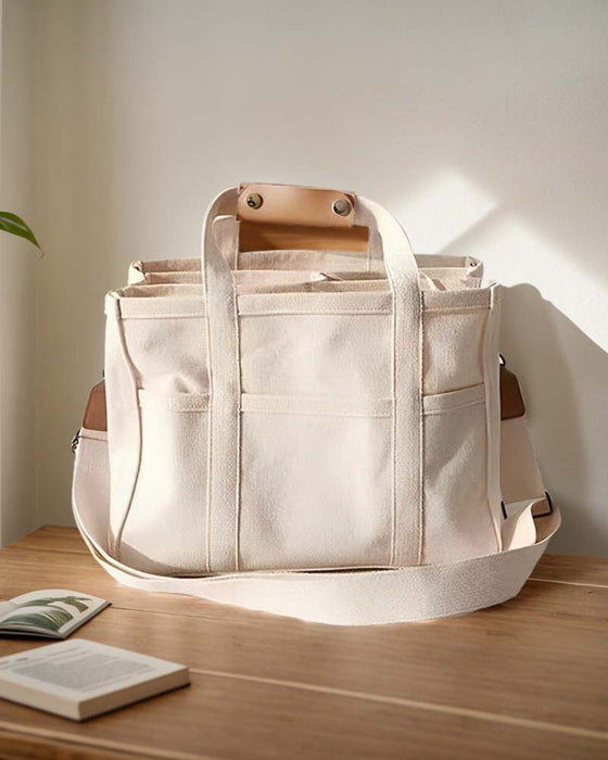 Kanvastaske med dobbelte hanke og stor kapacitet