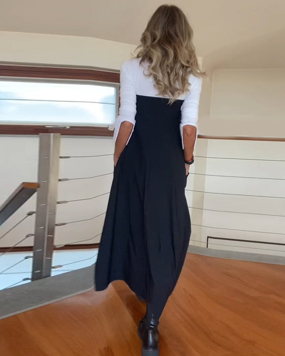 Stilfuld mørk nederdel med lynlåslommer