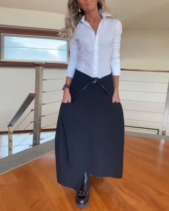 Stilfuld mørk nederdel med lynlåslommer