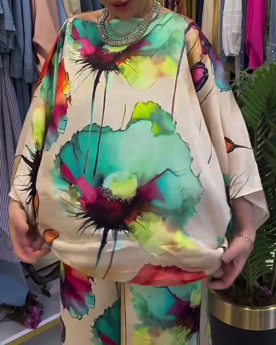 Buksedragt med lotusblomst print