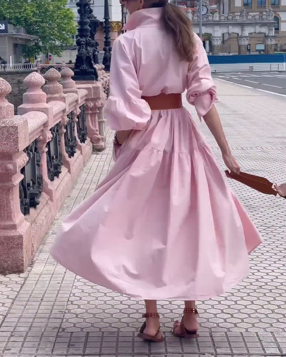 Lyserød maxikjole med flæser og skjortekrave