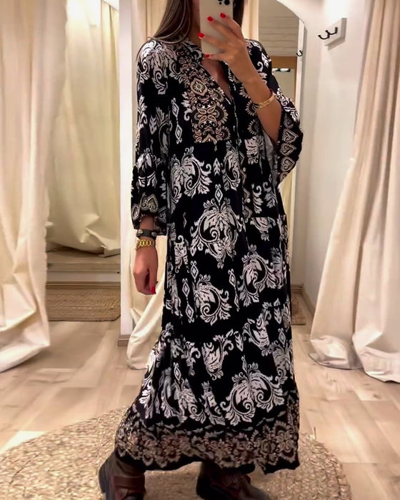 Løs vintage kjole med print og plissering