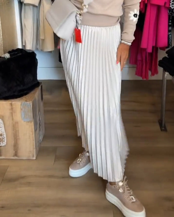 Plisseret ensfarvet kjole