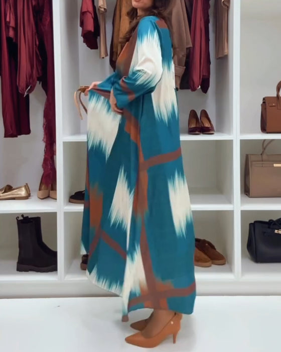 Moderne Trykt Kjole Med Rund Halsudskæring Og Lange Ærmer