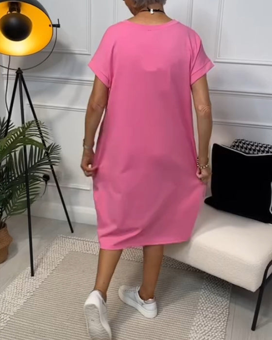 Sort kortærmet kjole med 'HOPE' motiv