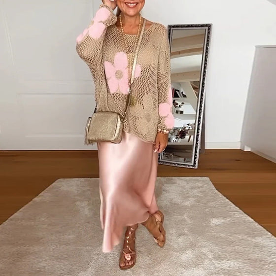 Hulmønstret sweater med blomstermotiver