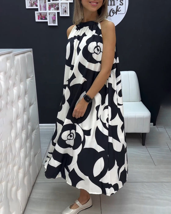 Sort-Hvid kjole med elegant designerprint