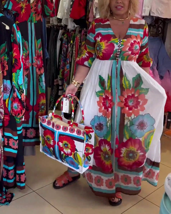 Lang blomsterkjole med svaj