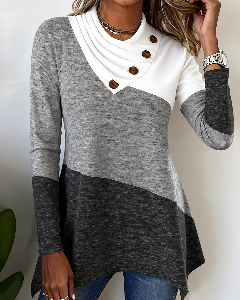 Moderne Top Med Kontrastfarve Og Patchworkdetaljer