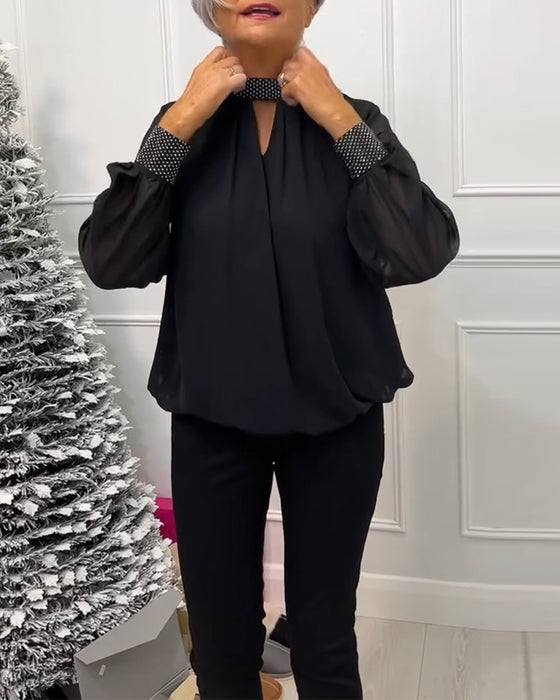 Stilfuld ensfarvet bluse med ståkrave