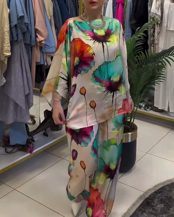 Buksedragt med lotusblomst print