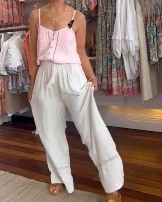 Hvide behagelige bredbenede bukser med lommer