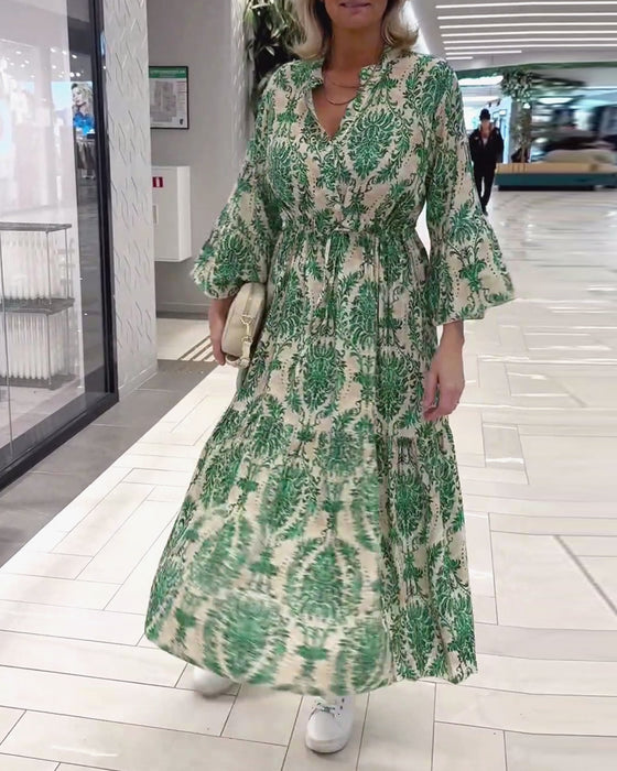 Mønstret kjole med klokkeærmer og snøre