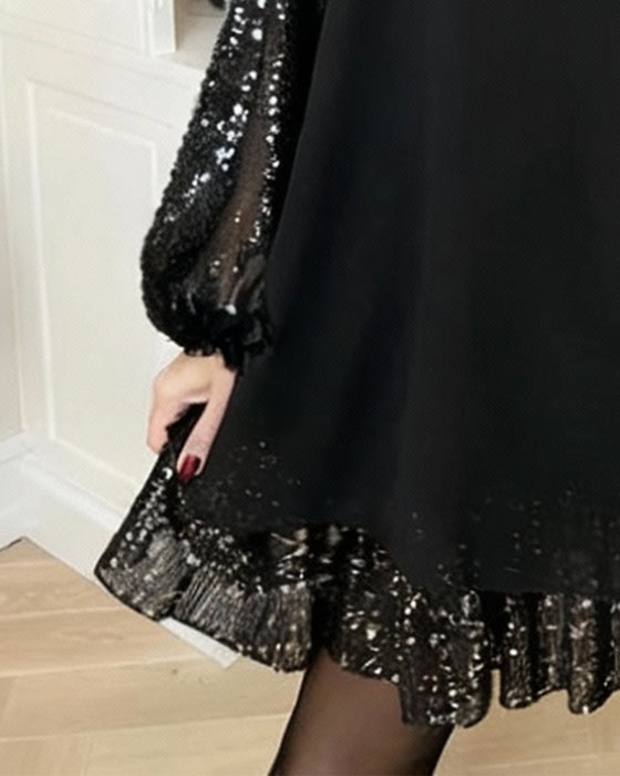 Løstsiddende Kjole Med Lanternearmer Og Rund Halsudskæring