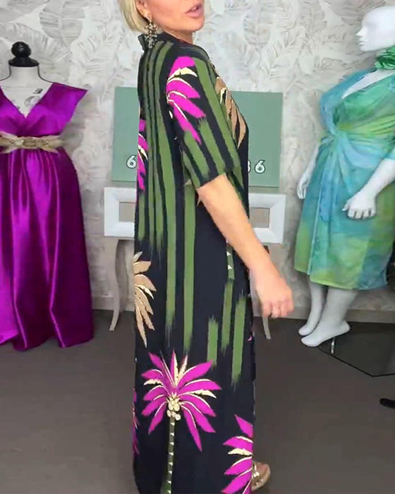 Kortærmet kjole med slids og palmemotiv