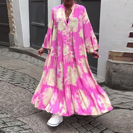 V-halset lyserød kjole med svaj og print