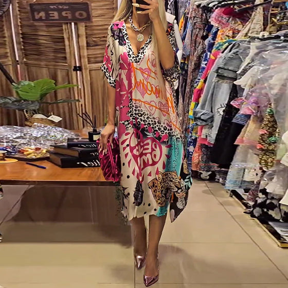 Farverig patchworkkjole med leopardmotiv og delvist leopardprint
