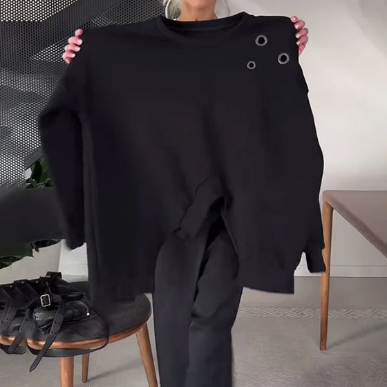 Sort sweater i løs pasform med slids