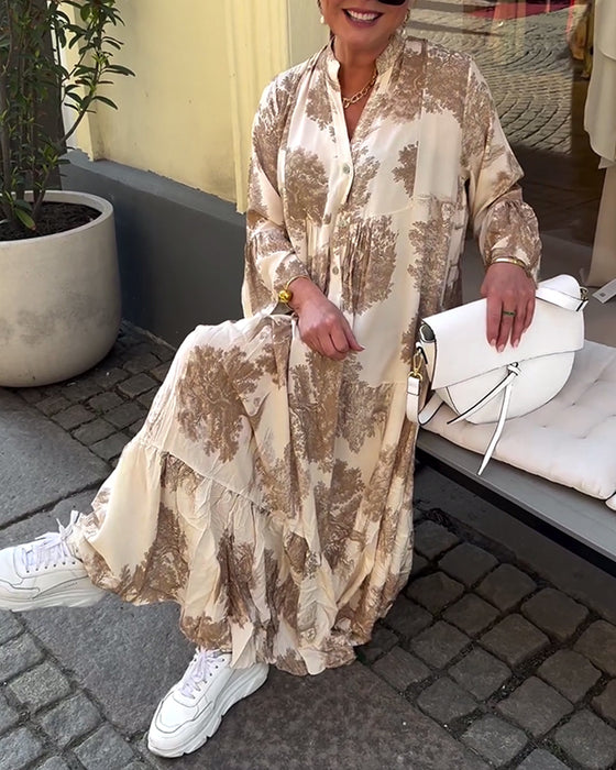 V-halset lyserød kjole med svaj og print