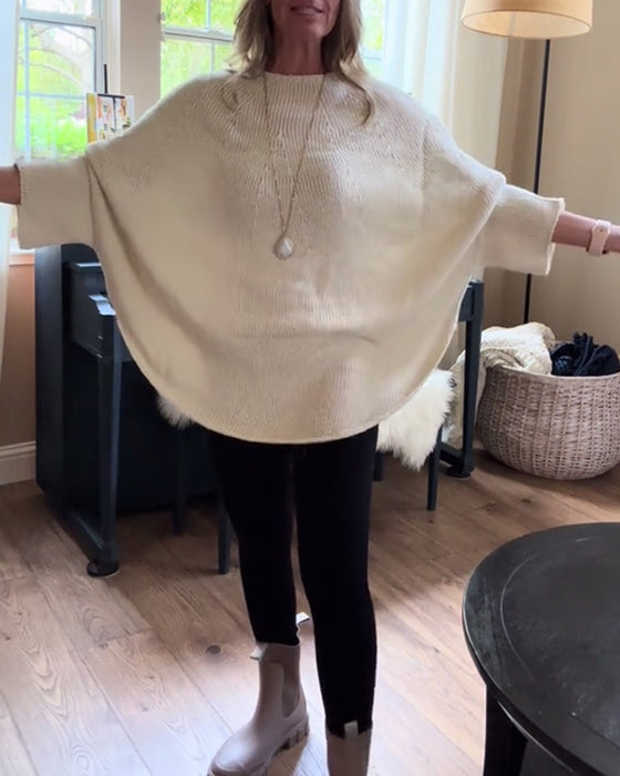 Stilfuld rød sweater i løs pasform med flagermusærmer