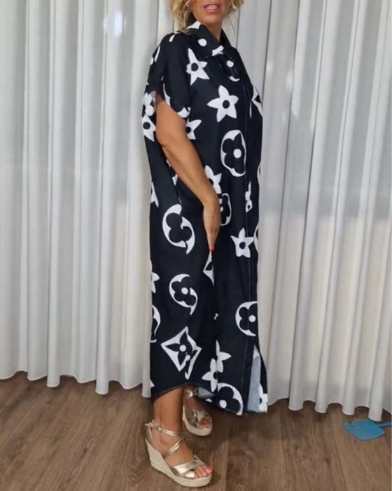 Sort kjole med reverskrave og monogram print