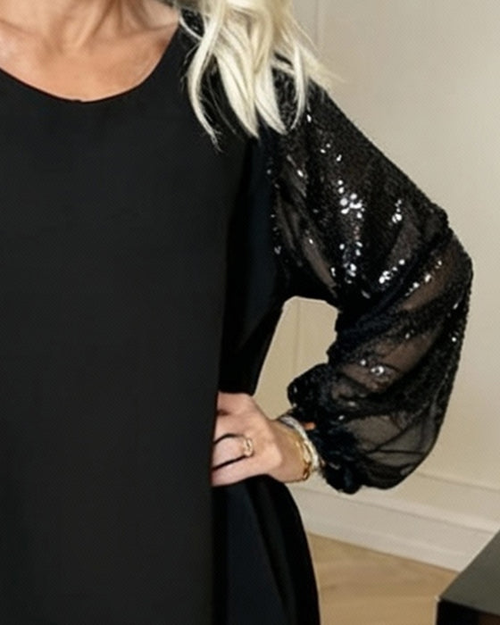 Løstsiddende Kjole Med Lanternearmer Og Rund Halsudskæring