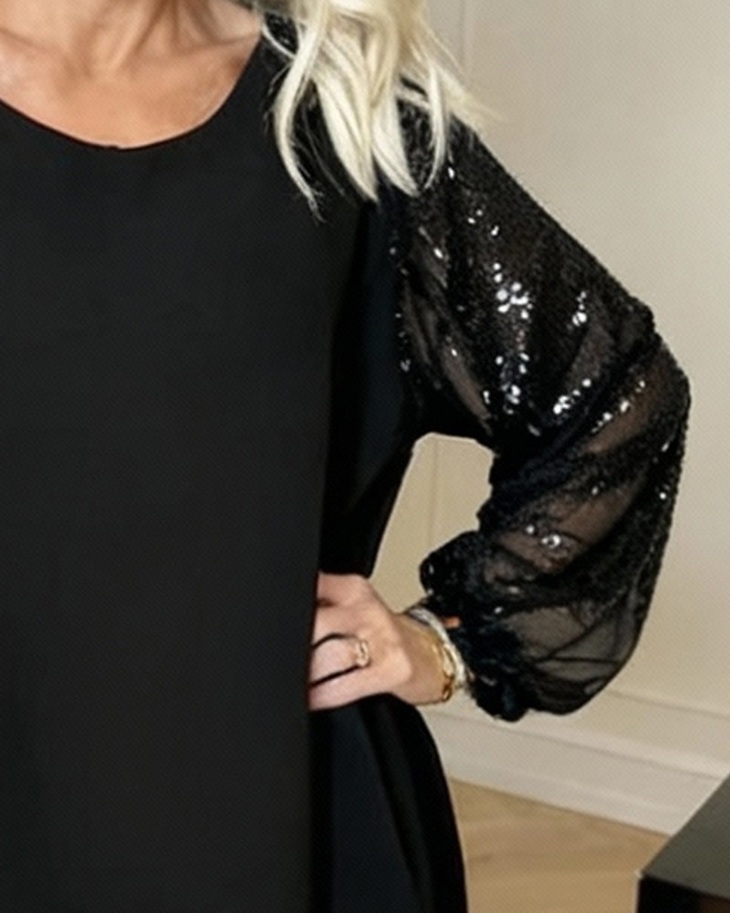 Løstsiddende Kjole Med Lanternearmer Og Rund Halsudskæring