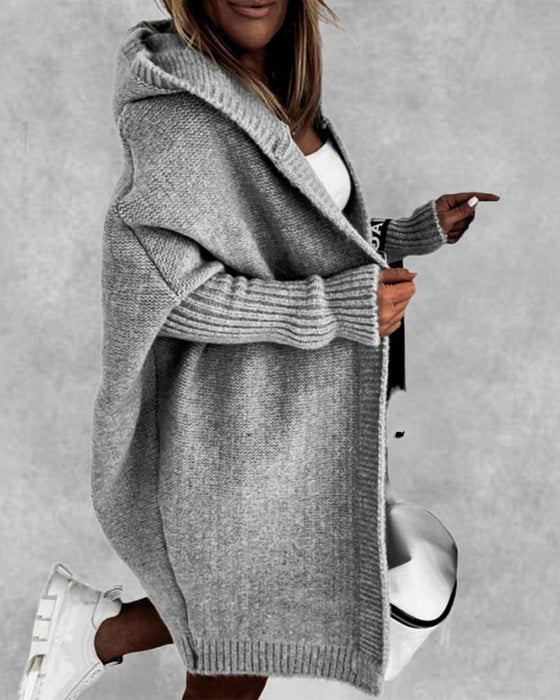 Oversized ensfarvet frakke