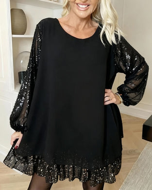 Løstsiddende Kjole Med Lanternearmer Og Rund Halsudskæring