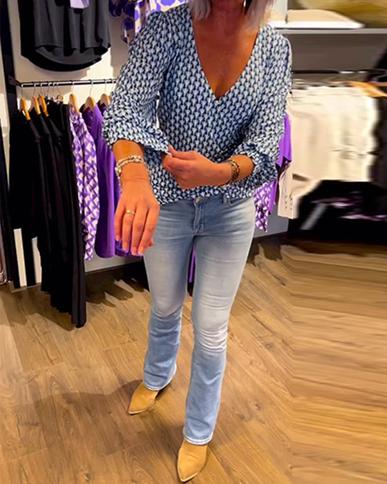 Prikmønstret langærmet top med dyb V-udskæring