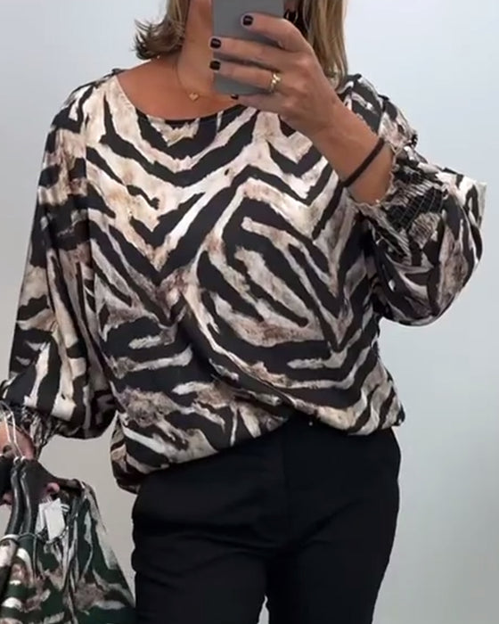 Zebrastribet bluse i afslappet pasform