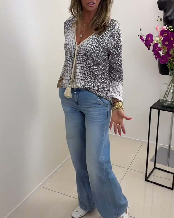 Bluse med frynser og vide ærmer