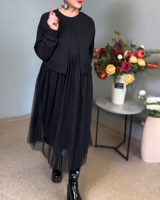 Elegant kjole med gennemsigtigt yderlag