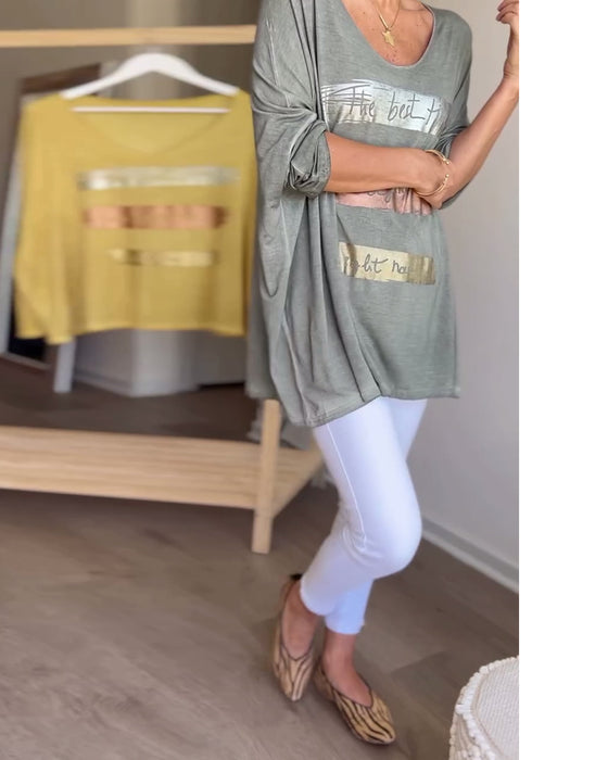 Langærmet top med rund hals og skriftmotiv