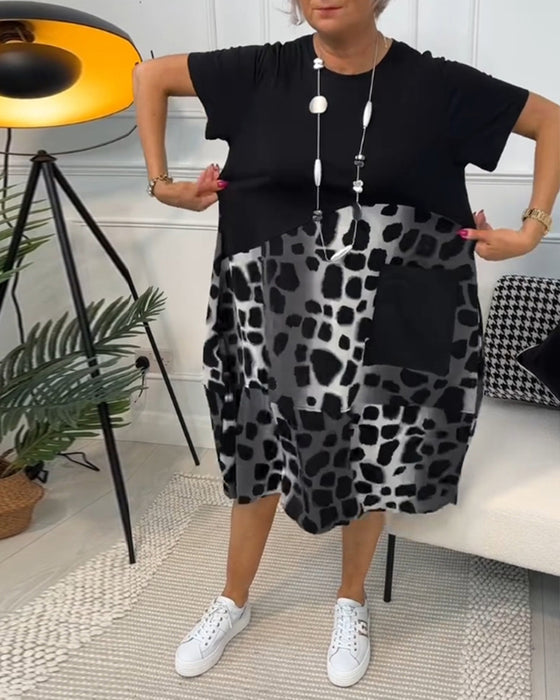 Sort patchwork kjole med rund halsudskæring