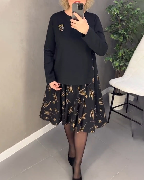 Afslappet kjole med mønstret nederdel