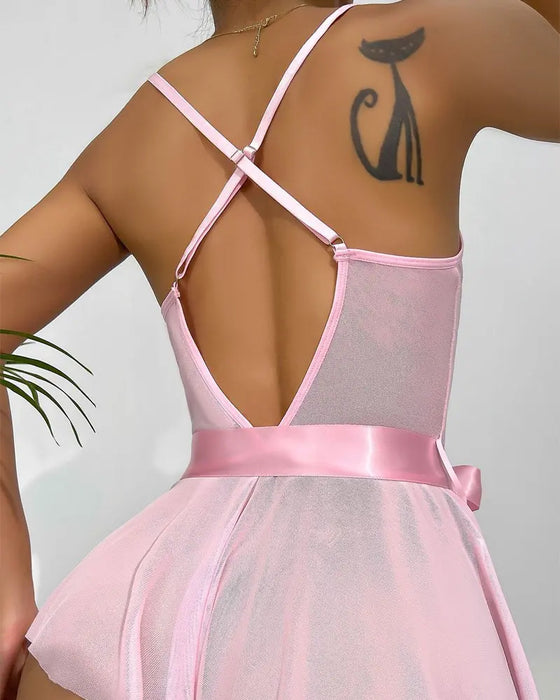 Sløjfedekoreret blondelingeri i ét stykke