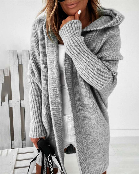 Oversized ensfarvet frakke