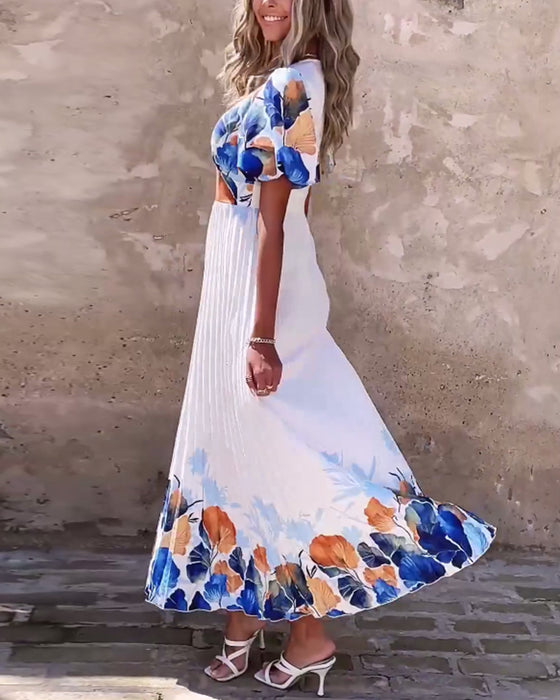 Kjole i dyb V-stil med bobleærmer