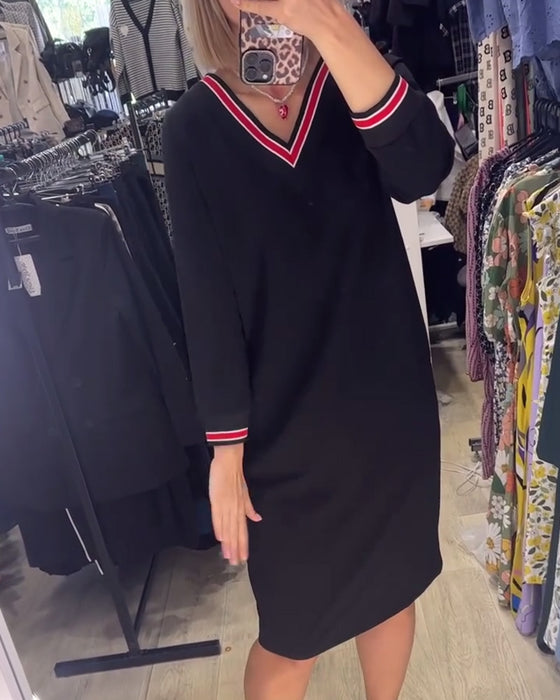 V-halset kjole med lommer