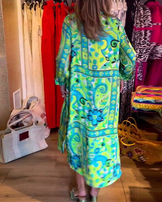 Lang grøn kjole i løs pasform med print