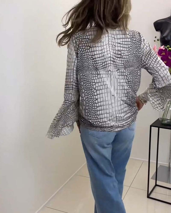 Bluse med frynser og vide ærmer