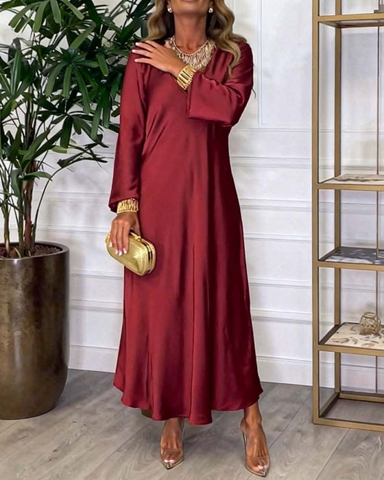 Elegant Kjole Med Lange Ærmer Og V-Hals
